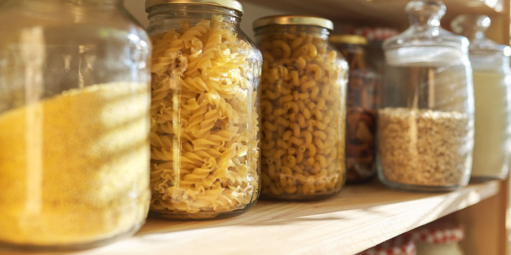Dry foods, rice and pasta on pantry shelving
